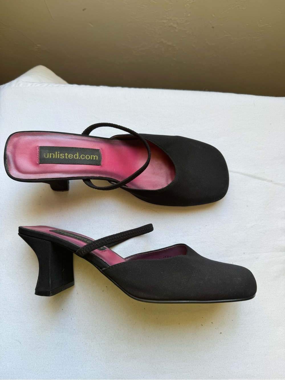 Y2K Unlisted Black Mule Heels featuring a sleek minimalist silhouette, Size 7.5